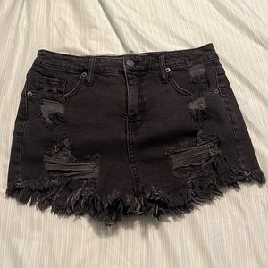 Distressed black jean shorts